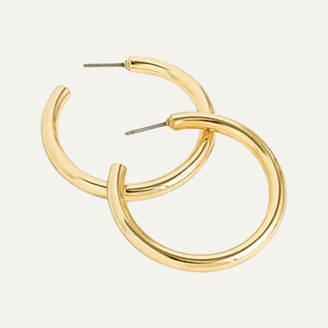 Mini tube hoop earrings in matte gold by J.Crew